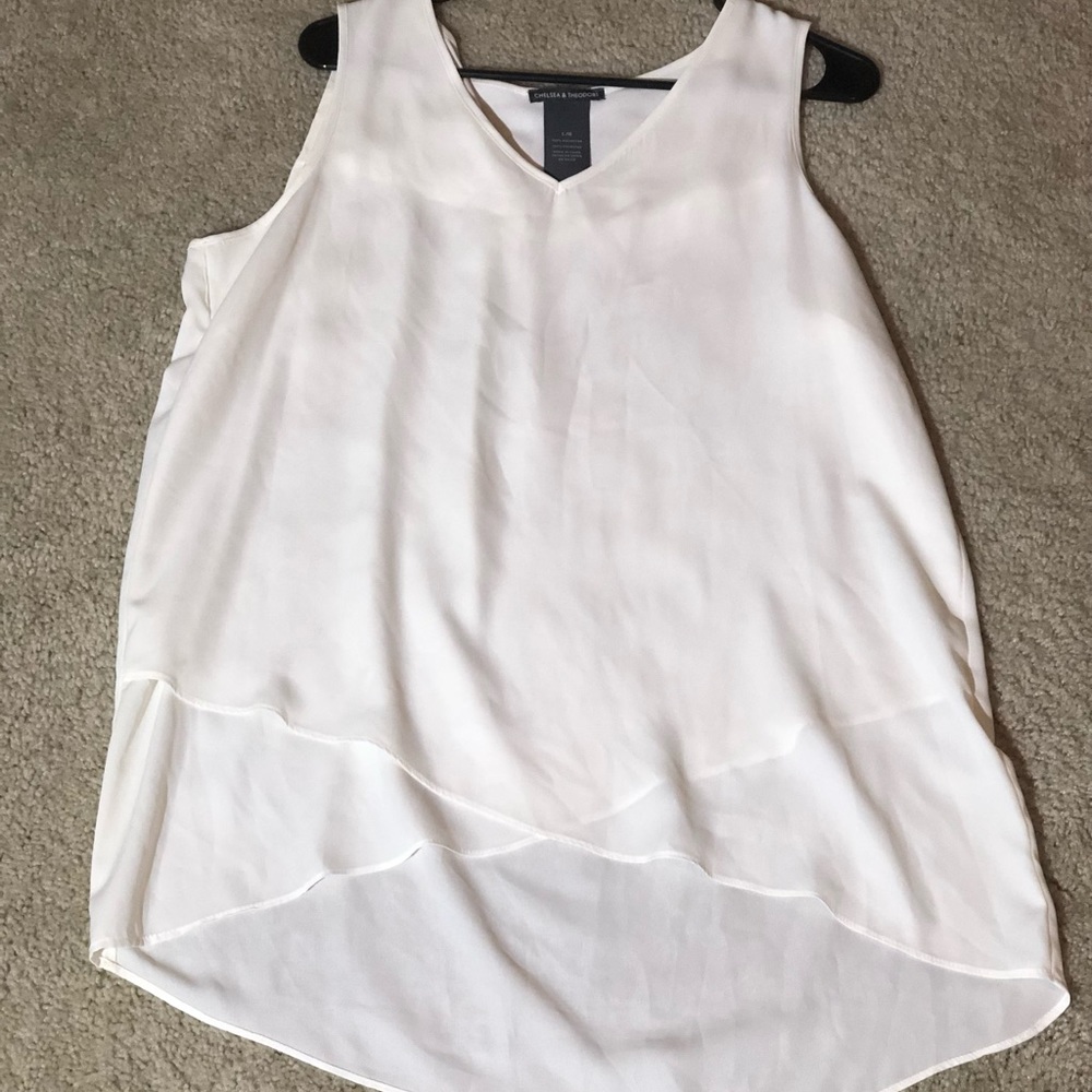 Sheer overlay v-neck blouse. Lower on back - L
